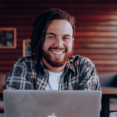 Young man at laptop - cropped