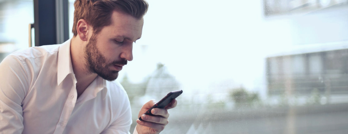 Man looking at mobile
